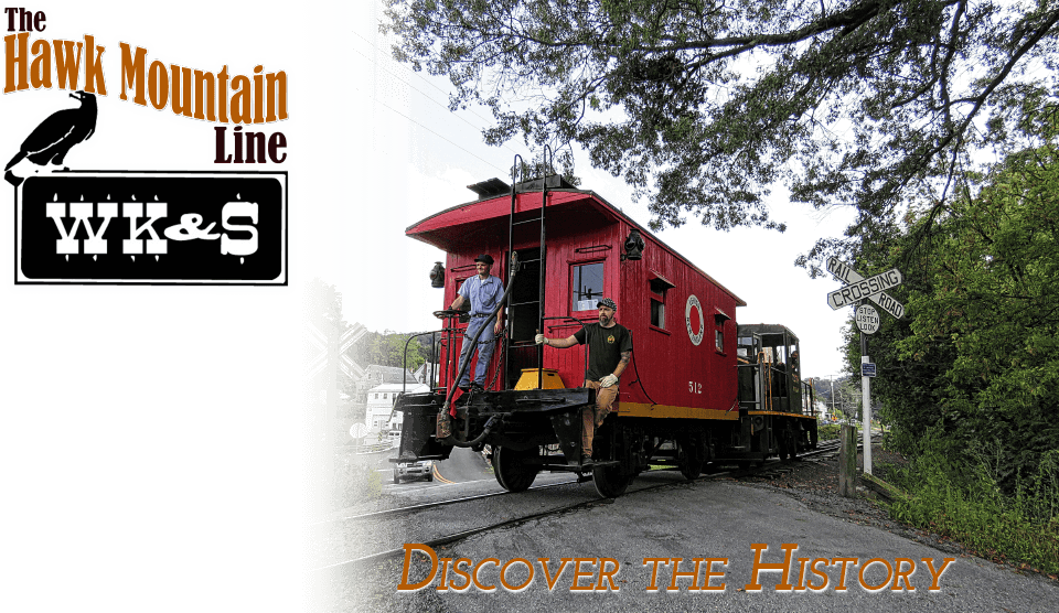 bobber train car on the tracks with men driving it